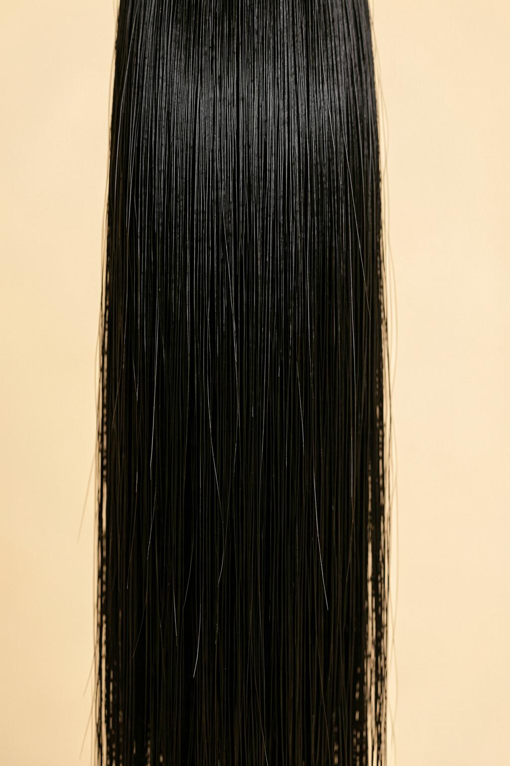 Sleek, glossy virgin straight hair
